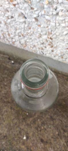 Smirnoff volka 3 litre bottle ,,with cork ,nice patina condition, handy for 1 or 2 euro coins ,etc ,,or display advertising item for home bar etc ,sold as is,