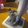 Vintage Sculpture of an Elegant Lady with a Dog Image 4