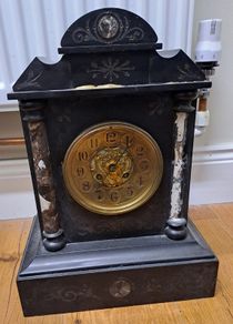 Marble and brass mantle clock