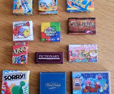 Dolls house - boardgames and boxed toys.. incl Miccro toys and mini brands