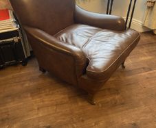 Howard style leather armchair