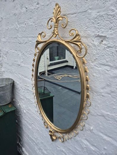 A Mirror Large heavy Vintage Rococo design filly bevelled oval Mirror
