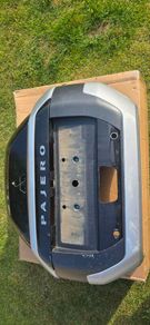 Mitsubishi Pajero rear door, spare wheel carrier cover / trim