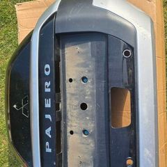 Mitsubishi Pajero rear door, spare wheel carrier cover / trim