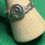 Handmade sterling silver Celtic spiral woven band ring. Size o Image 3