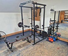 Home Gym set up w/ plates and kettlebells