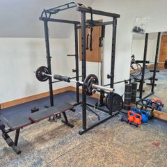 Home Gym set up w/ plates and kettlebells