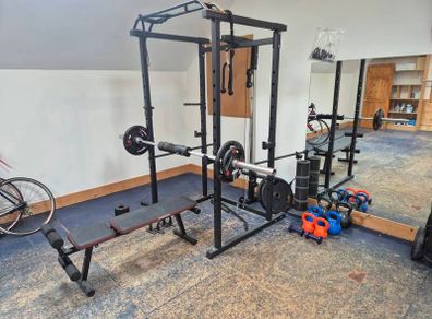 Home Gym set up w/ plates and kettlebells
