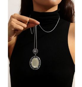 Lovely Long Necklace with a Moon Stone Pendant