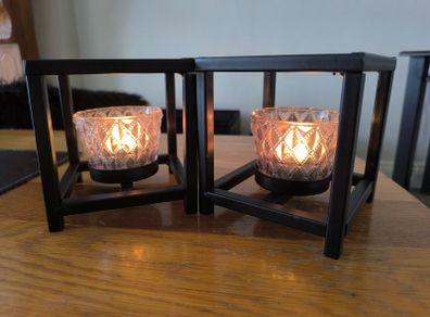 2 black metal tealight holders both for 10e
