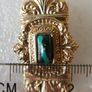 Vintage gold tone brooch with Green Faceted Stone Image 8