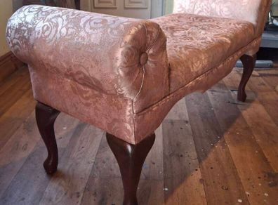 very old small type sofa