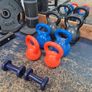 Home Gym set up w/ plates and kettlebells Image 8