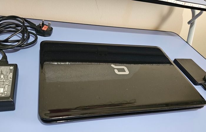 HP Compaq CQ58 Laptop Intel Celeron, 8GB RAM, Samsung 128GB SSD + Extra Storage Toshiba 750GB External USB HDD.