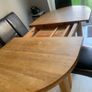 Solid extendable oak table- very good in Image 4