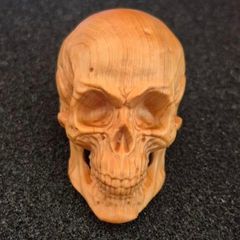Carved wooden skull.