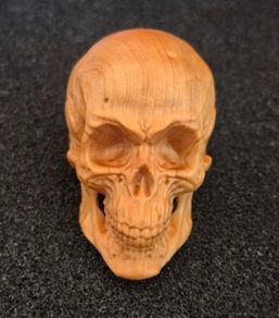 Carved wooden skull.