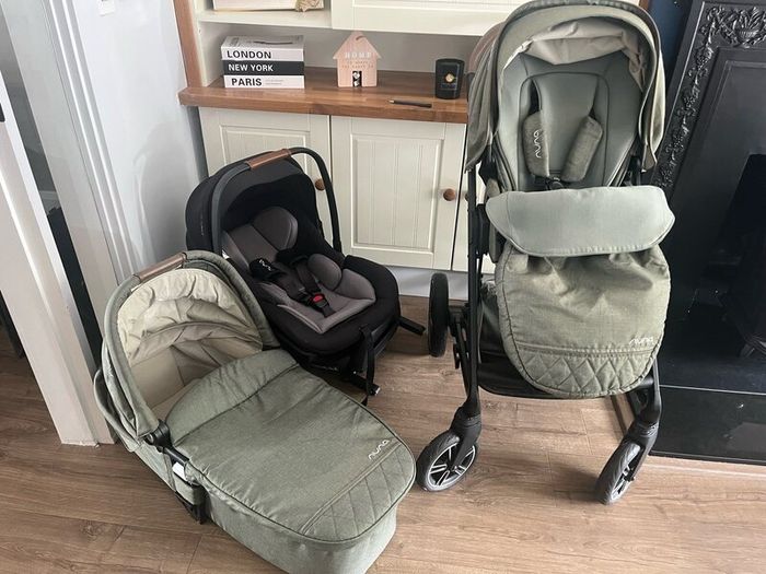 Nuna travel system including isofix base