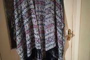 Dunne Stores, bohemian-style fringe kimono.