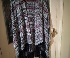 Dunne Stores, bohemian-style fringe kimono.