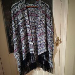 Dunne Stores, bohemian-style fringe kimono.