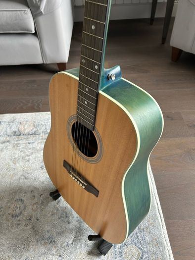 Acoustic guitar with strap, bag, stand and accessories