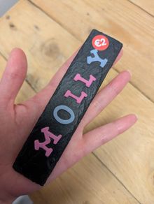 Slate sign with "Molly"