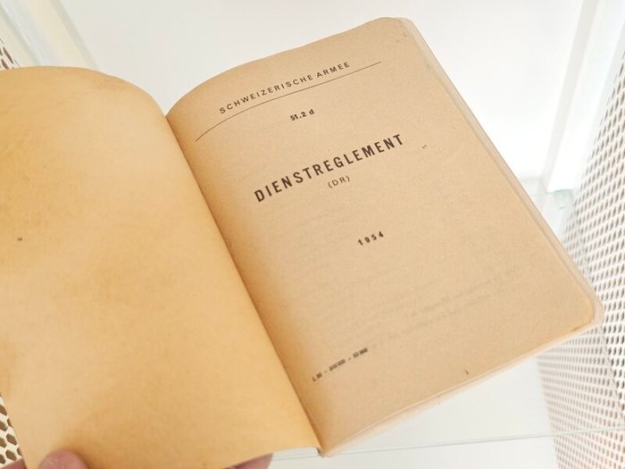 Vintage 1954 Swiss Army service regulation book, known as the Dienstreglement Collectable Militaria