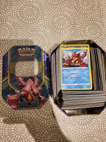 280 Pokemon Cards and Pokemon Tin