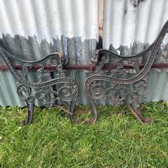 Pair of decorative cast iron bench ends