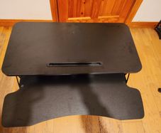 Standing desk adjustment