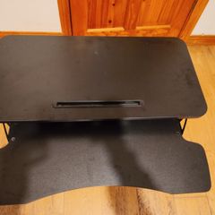 Standing desk adjustment