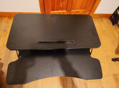 Standing desk adjustment