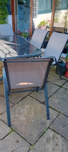 Glass top Garden table and chairs