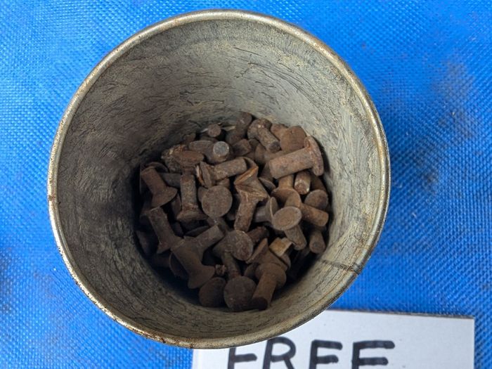 100 rivets in a Brasso Tin