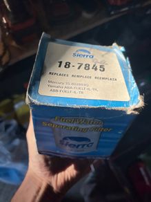 Outboard motor fuel/water separating filter