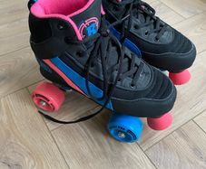 Children's Roller Skates size 4 with protective pads and box