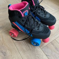 Children's Roller Skates size 4 with protective pads and box