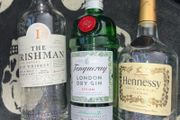 Empty gin Whiskey Hennessy Bottles