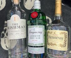 Empty gin Whiskey Hennessy Bottles