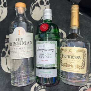 Empty gin Whiskey Hennessy Bottles