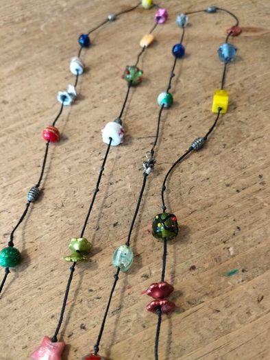 handmade funky necklace featuring a variety of colourful glass and stone beads
