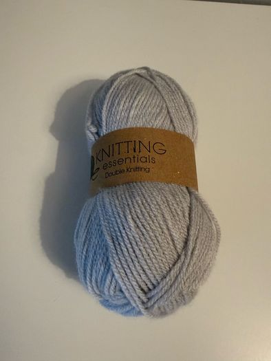 5 balls of grey yarn wool