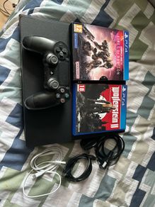 PlayStation 4 Pro 1TB SSD with games, cables and controller
