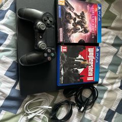 PlayStation 4 Pro 1TB SSD with games, cables and controller