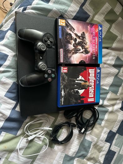 PlayStation 4 Pro 1TB SSD with games, cables and controller