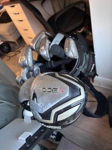 golf clubs and caddy