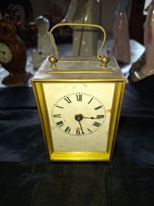 Antique French Carriage Clock Tischuhr Era Likely dating from 1880 to 1900 Material Brass Casing with a white dial and black numerals,