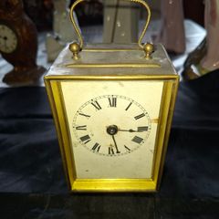 Antique French Carriage Clock Tischuhr Era Likely dating from 1880 to 1900 Material Brass Casing with a white dial and black numerals,