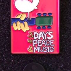 Woodstock, pin back badge.
